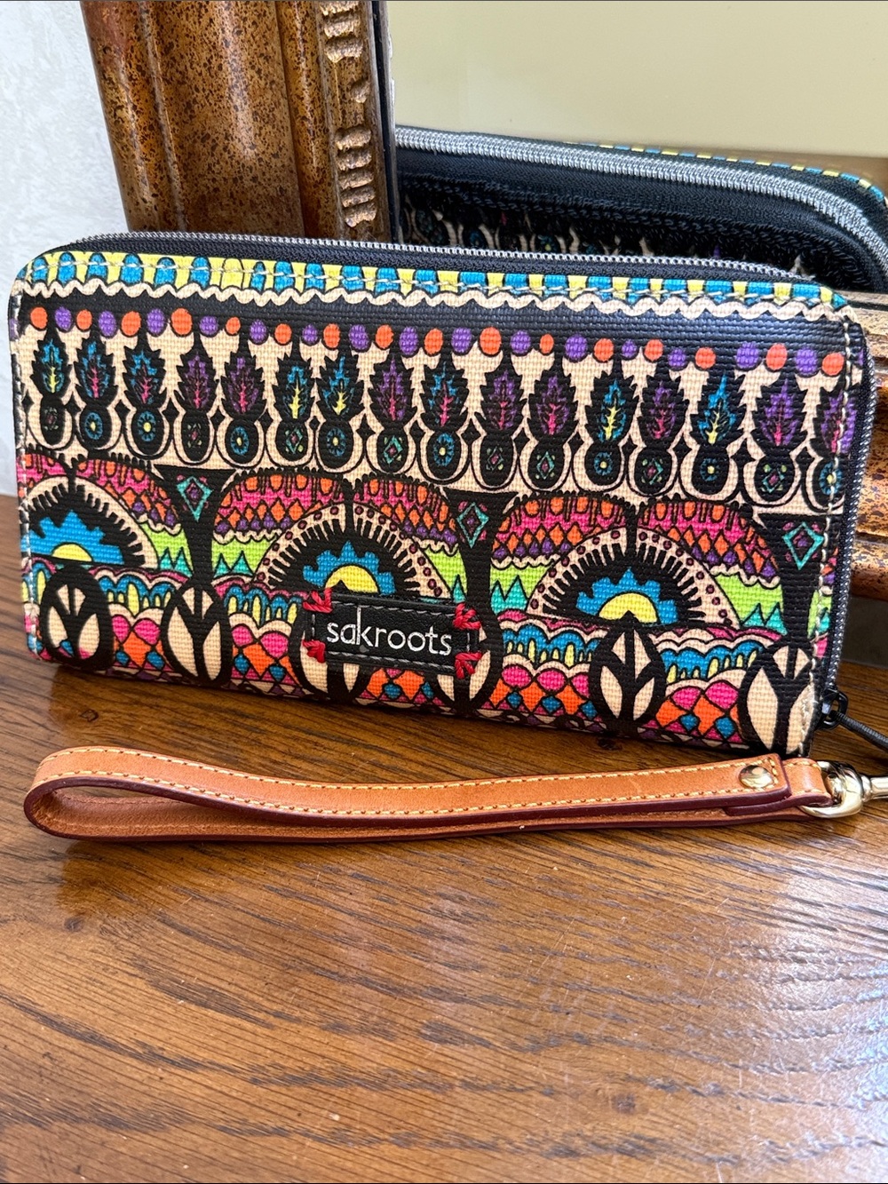 NWOT Sakroots Colorful Wristlet Wallet w/peace symbols and embroided elephant.